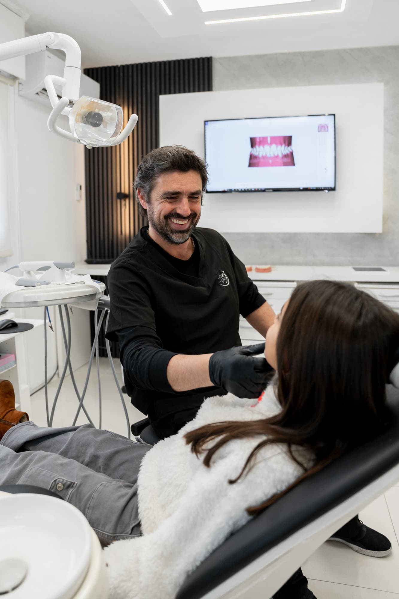 Dr. Federico Nappa Severino during an orthodontic consultation with a patient